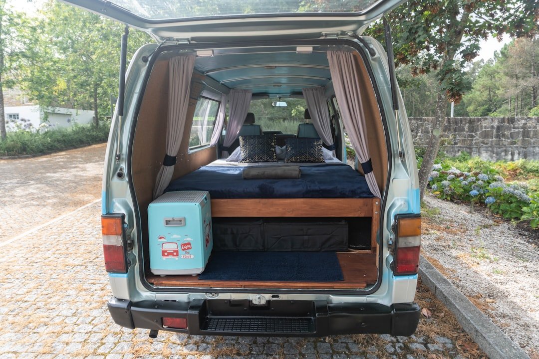 A van with a bed in the back of it